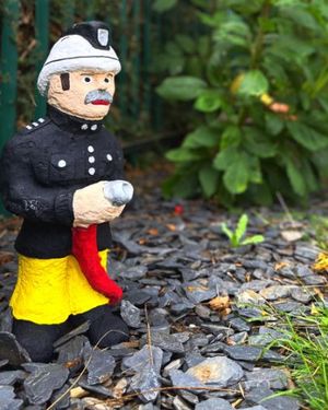 The firefighter garden sculpture has returned to duty within the grounds of Market Drayton Fire Station after an extended period away. Picture: Market Drayton Fire Station.