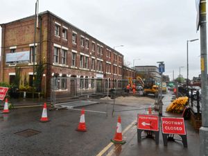 Supporting image for story: Pictures show work going on to repair Kidderminster road after burst pipe