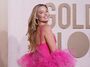 Supporting image for story: Margot Robbie leads stars at Golden Globes wearing 1977 Superstar Barbie ensemble