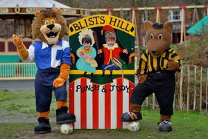 Taken in 2022, here we see replica vintage football kits for Shrewsbury Town and Wolverhampton Wanderers, as worn by Wolfie and Blue (Shrewsbury Lion)