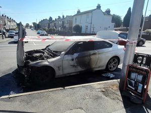 Supporting image for story: West Bromwich High street left full of smoke after car fire