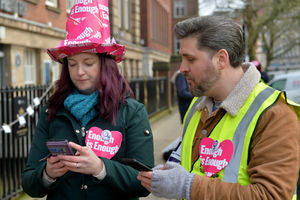 It was a colourful scene, with hats and armbands in the strike slogan
