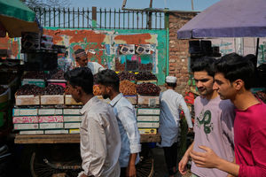 Delhi offers an assault to the senses and is full of life. A roadside vendor sells dates for Ramadan near Jama Masjid.