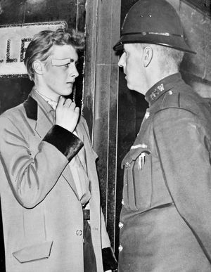 Move along son... A Teddy Boy in Queen Square, Wolverhampton, in 1959. Note the plaster.