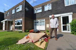 Anthony Woolley, 82, with his carpet which were thrown out 