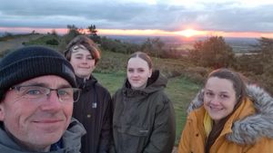 Peter and his children at the top of the Wrekin on Thursday
