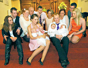 Supporting image for story: Telford quads christened in front of packed church