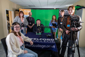 Shaun Davies MP (centre) with media students at Telford College.