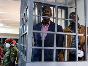 Supporting image for story: Ugandan activists demand release of opposition leader facing military trial