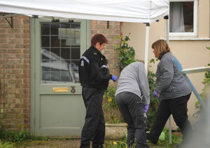 Officers at the scene on Rushbury Road