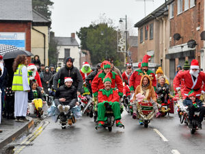 Supporting image for story: And they're off! Wheelbarrow racers complete festive dash around town's pubs