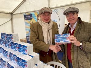 Supporting image for story: MP Philip Dunne lends a helping hand to give out face masks to those in need