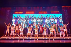 The We Will Rock You cast in action