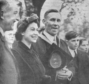 The Queen watches a game of fives at Shrewsbury School during her visit of October 24, 1952, flanked by, left, chairman of governors Sir Offley Wakeman, and right, headmaster Jack Peterson.