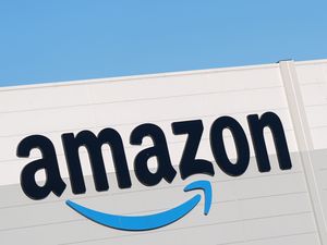 Supporting image for story: Amazon cutting 14,000 corporate jobs amid AI investment push
