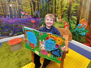 Supporting image for story: Winnie the Pooh and Alice star as school transforms library into magical wonderland