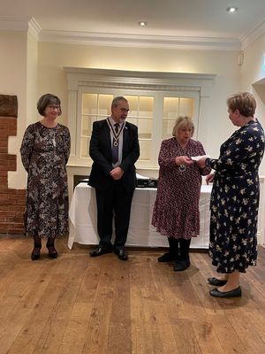 Tracy Stokes, Club President Alan Matkin, Carole Holdcroft with Sue Harrel 