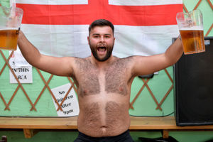 Aaron Ditchburn wears the flag with pride at The Old Bush Inn, Albrighton 