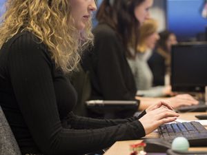 People at work at keyboards