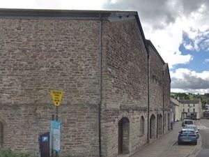 Supporting image for story: Brecon Market Hall will be sold for £75,000 less than expected. 