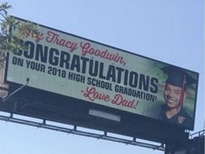 Supporting image for story: Dad uses giant electronic billboard to congratulate graduating son