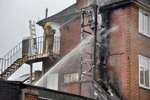 Firefighters dealing with the blaze at Kay's Lounge