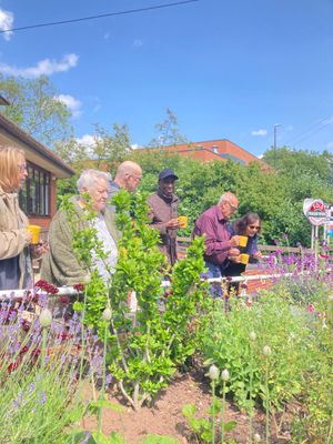 Walsall Society for the Blind service users enjoy the new garden