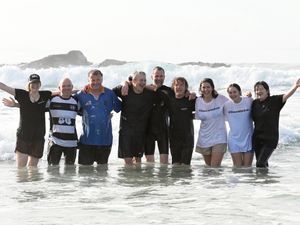 Supporting image for story: Journalists swim in solidarity one year since US reporter imprisoned in Russia