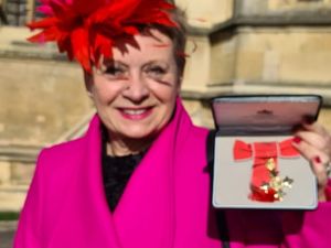 Supporting image for story: Founder of Buddy Bag Foundation enjoys royal date as she collects OBE