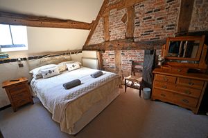 One of the bedrooms at The Olde Cow House 