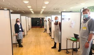 Members of the vaccination team inside the Town Hall