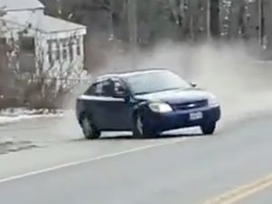 Supporting image for story: Driver loses control during police chase and crashes into trio of parked cars