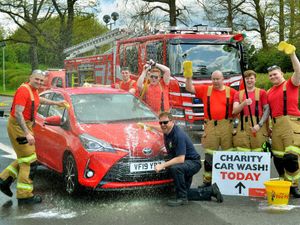 Supporting image for story: Flaming great result announced from south Shropshire fire fighters' charity car wash and raffle