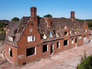Supporting image for story: Walsall pub demolition finally begins after blaze