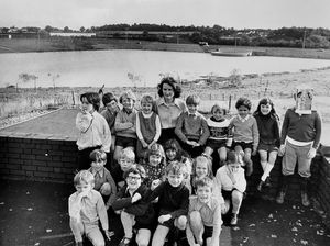 Mrs Kate Mansell and her class at Brookside, Holmer Lake First School, October 23, 1973. In the background is the eastern primary road, know now as the A442 Queensway.