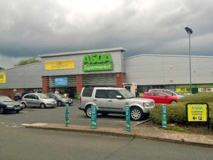 Supporting image for story: Robbers threaten to shoot Asda staff