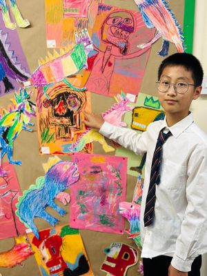 Nathan, Year Six  proudly showcasing his work 