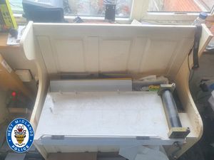 A number plate maker found at Day's house