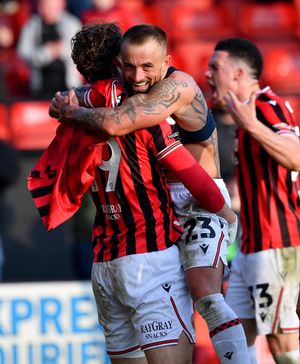 Alex Pattison celebrates his first goal for Walsall, as his long-range stunner secured victory in the final seconds.