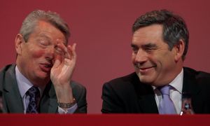 Britain's former Prime Minister Gordon Brown sits with Alan Johnson during the annual Labour Party conference in Bournemouth in 2007