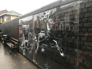 Supporting image for story: Banksy artwork in Birmingham preserved following vandalism