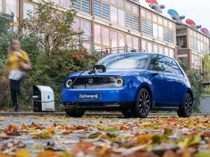 Supporting image for story: Portable EV charger to give city electric car owners a boost