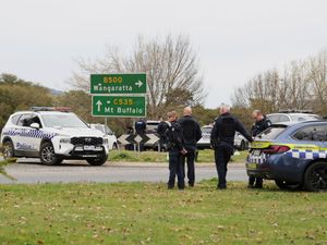 Supporting image for story: Manhunt under way after two police officers shot dead in rural Australia