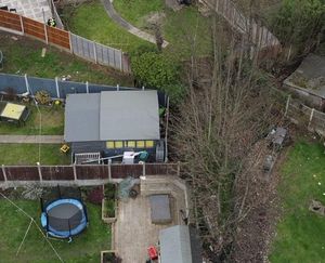 The suspect is virtually invisible in this drone image. Photo: @dronesWMP