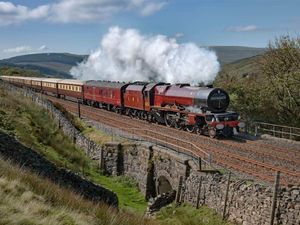 Full steam ahead ... the Northern Belle thunders over the picturesque Settle-Carlisle line