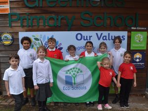 Supporting image for story: Sustainability champions: pupils at Greenfields Primary School receive Eco-Schools Green Flag recognition