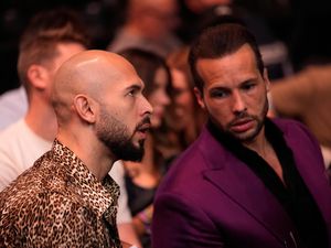 Andrew Tate (left) and Tristan Tate at a UFC 313 mixed martial arts event in Las Vegas