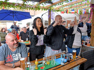 Supporting image for story: Drink it in: Pub fans roar England through to Euro 2020 final - in pictures