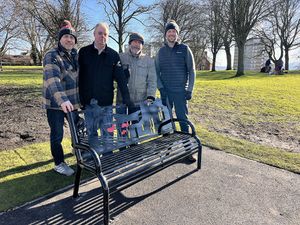 (L-R) Councillor Wayne Little, Shane Birch-Bastock, Frank Chamberlain and Councillor Adam Davies with one of the newly installed WW2 benches