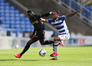 Watford's Ismaila Sarr (left) and Reading's Liam Moore